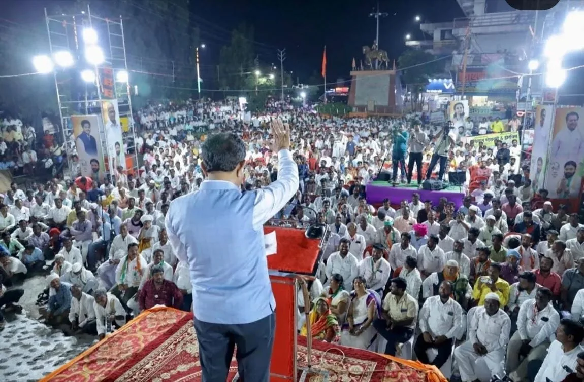 A Prajatantra-backed candidate addresses a packed campaign rally
